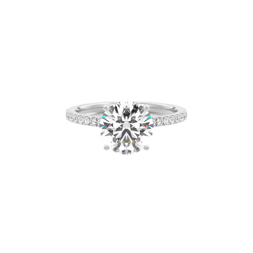 Moissanite engagement ring with round lab-created stone and pavé band on white background