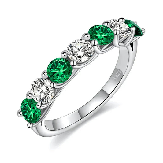 Sterling silver moissanite ring with alternating green and clear lab-made stones