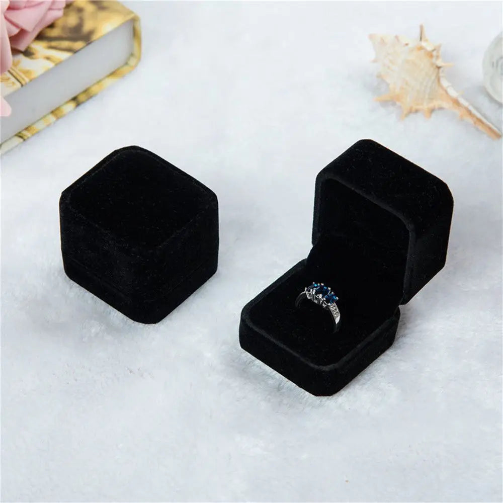 Luxury velvet black ring box – elegant jewelry packaging for proposals, gifts, and anniversaries. Available in 6 colors, perfect for showcasing engagement rings and fine jewelry.