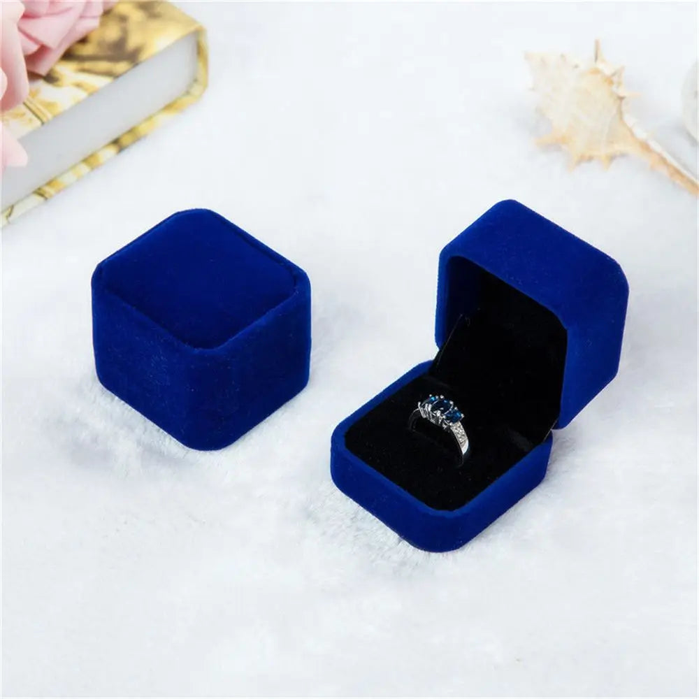 Luxury blue velvet ring box – elegant jewelry packaging for proposals, gifts, and anniversaries. Available in 6 colors, perfect for showcasing engagement rings and fine jewelry.