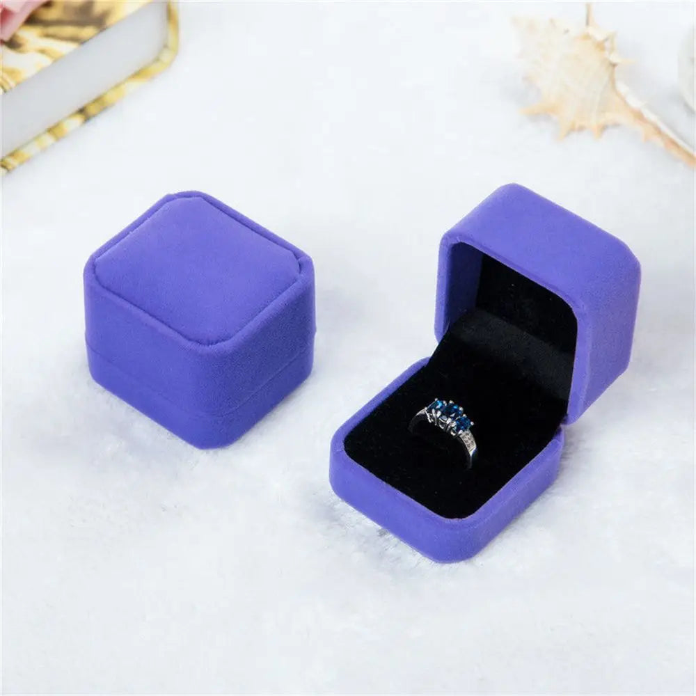 Luxury purple velvet ring box – elegant jewelry packaging for proposals, gifts, and anniversaries. Available in 6 colors, perfect for showcasing engagement rings and fine jewelry.