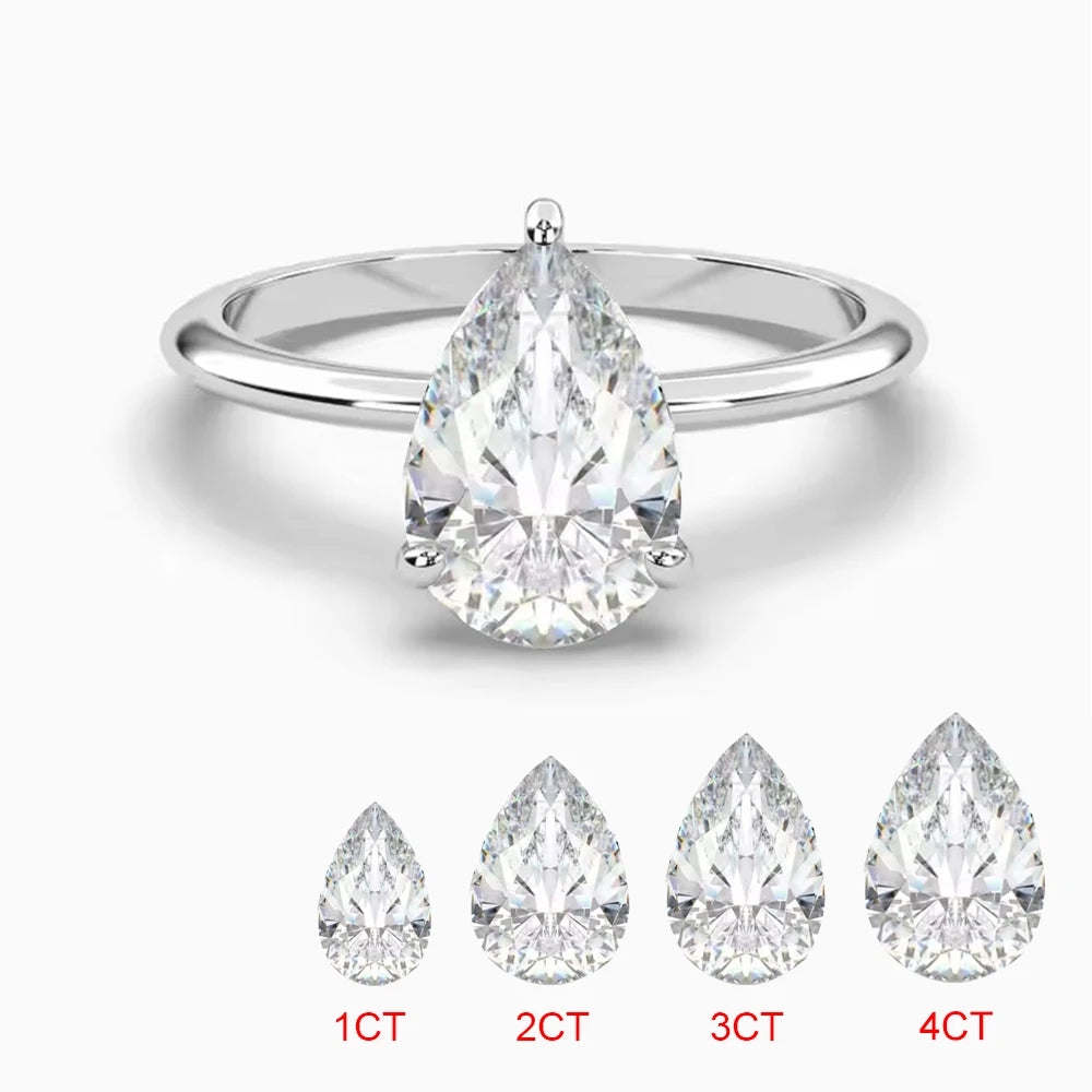 Pear cut, prong style moissanite ring in sterling silver 1-4 carat