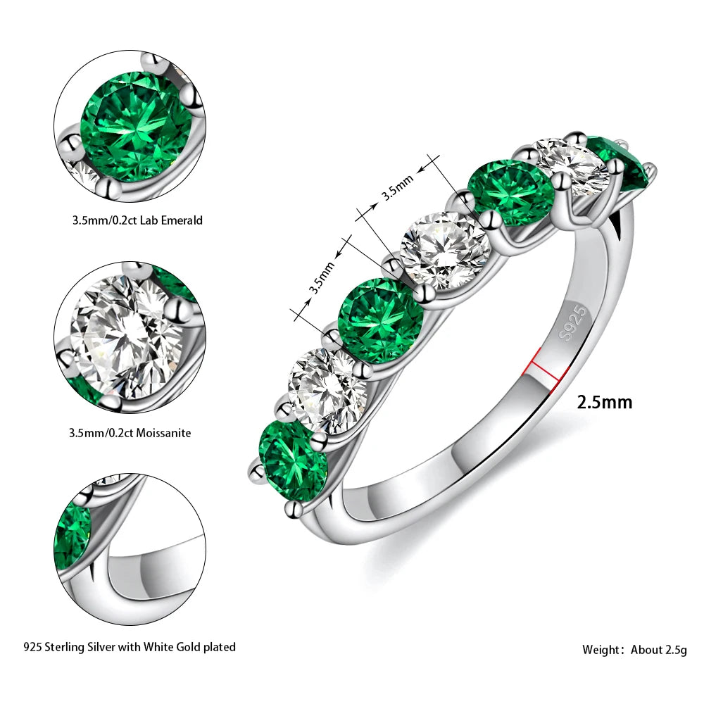 Moissanite and emerald engagement ring lab created white gold plated sterling silver. Perfect unique engagement ring or promise ring.