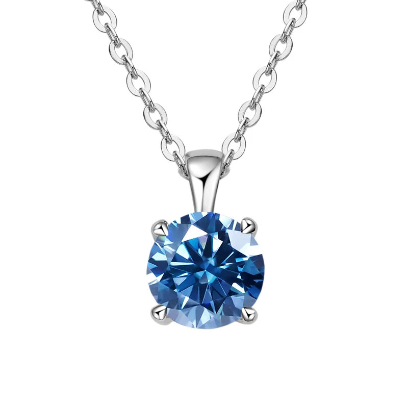 White gold-plated sterling silver necklace with a 1-carat sapphire blue moissanite pendant, round cut, for women.