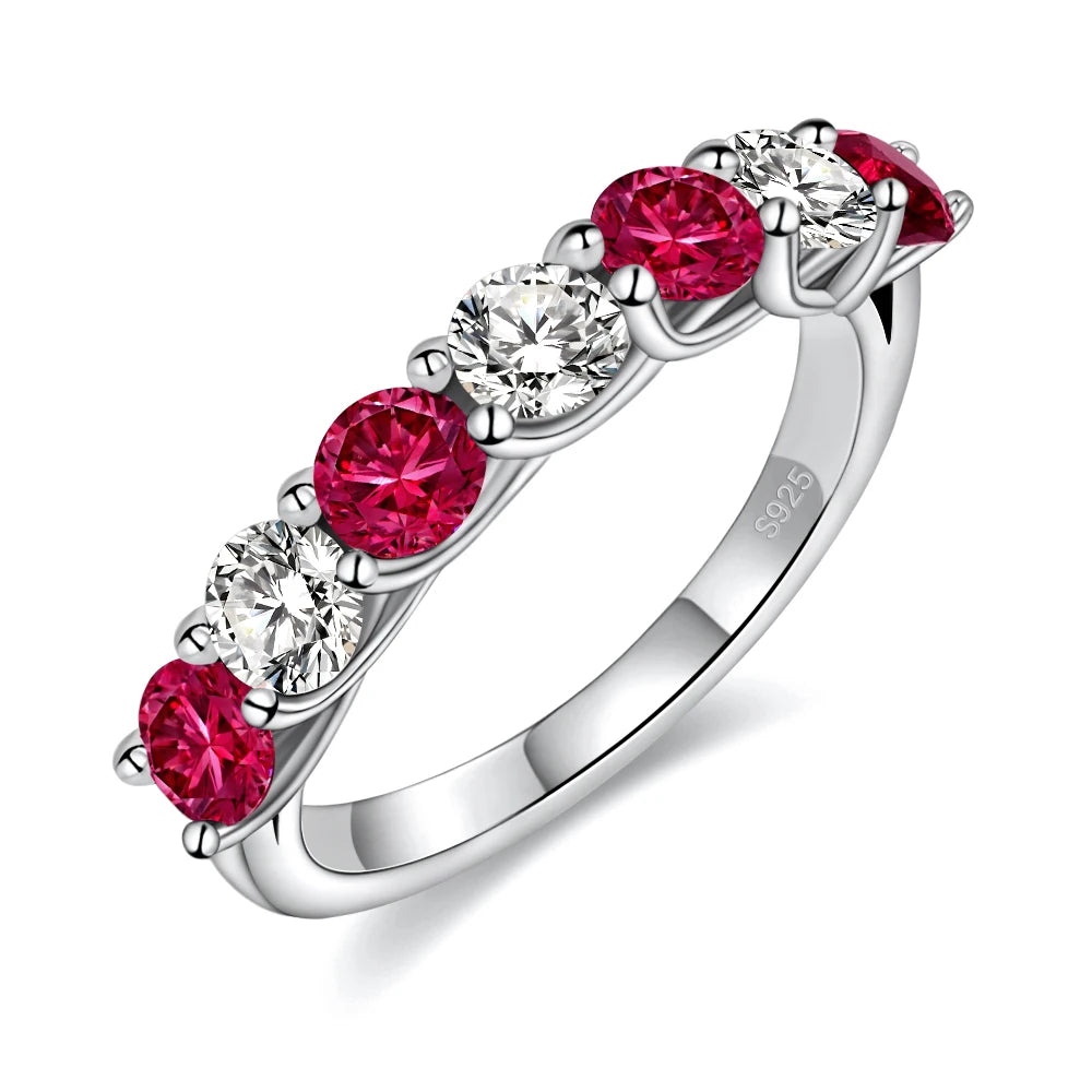 Moissanite and ruby engagement ring lab grown 18K white gold plated sterling silver. Perfect unique engagement ring or promise ring.